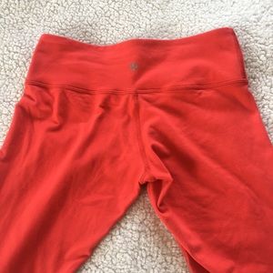 Red lululemon leggings with striped inner band